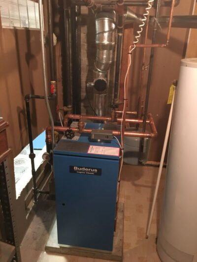 IMG_1440 600 Blue residential boiler with copper piping installed by HVAC contractor in Mukwonago, WI