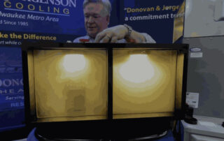 Phil demonstrating plasma technology by Donovan & Jorgenson Heating and Cooling in Mukwonago, WI