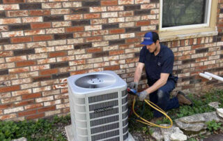 Technician installing Concord AC by Donovan & Jorgenson Heating and Cooling in Mukwonago, WI