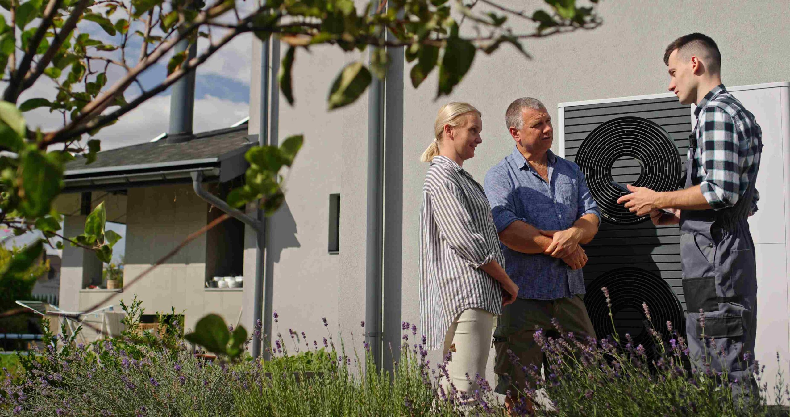 A Professional Explaining HVAC Best Practices to a Couple