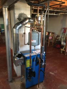 Boiler and piping setup in a basement in Mukwonago, WI
